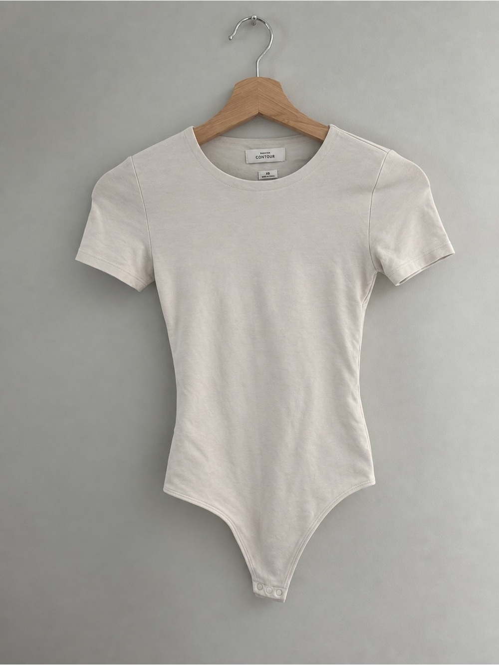 Babaton: Cream Short Sleeve Bodysuit
